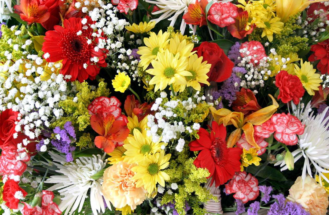 Συμβολισμός των πολύχρωμων λουλουδιών παζλ online από φωτογραφία