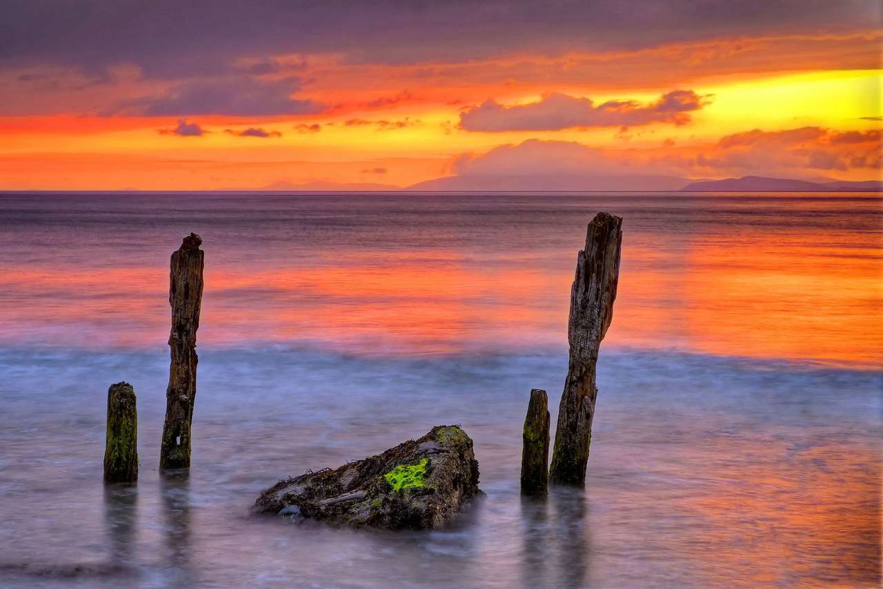Apus de soare pe plaja Rossbeigh (Irlanda) puzzle online din fotografie