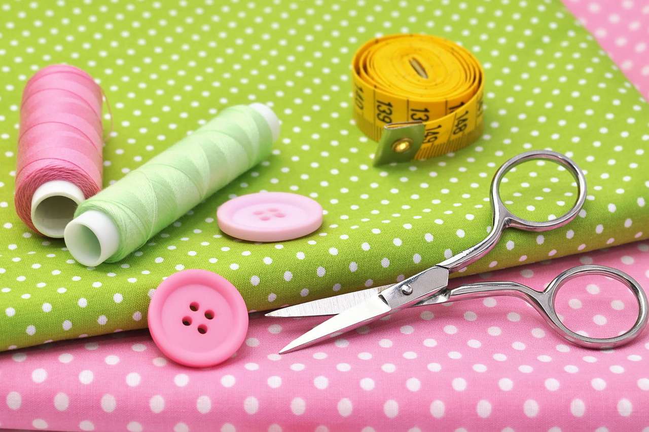 Sewing items on colorful fabrics puzzle