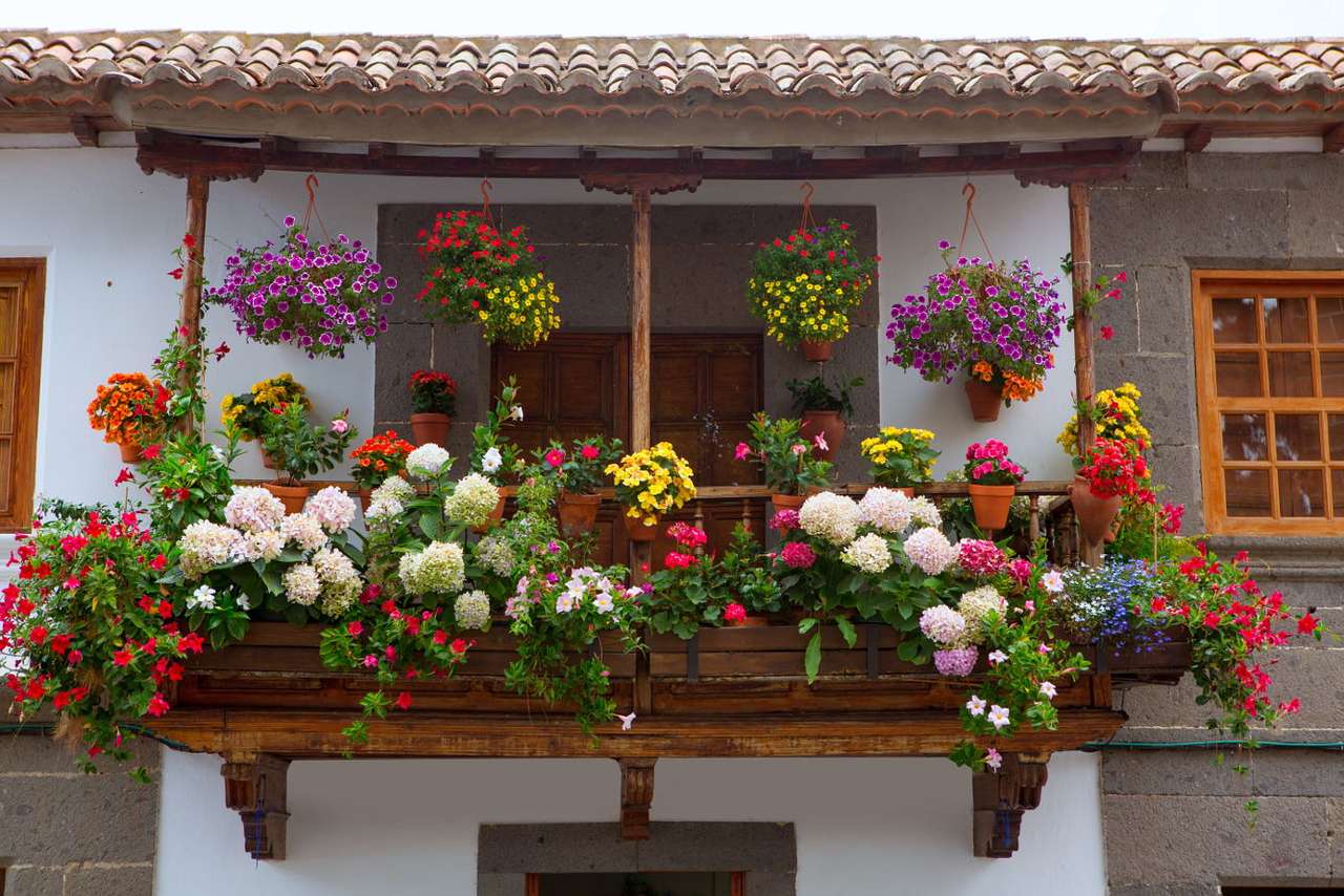 Балкон с цветя в Терор (Испания) онлайн пъзел
