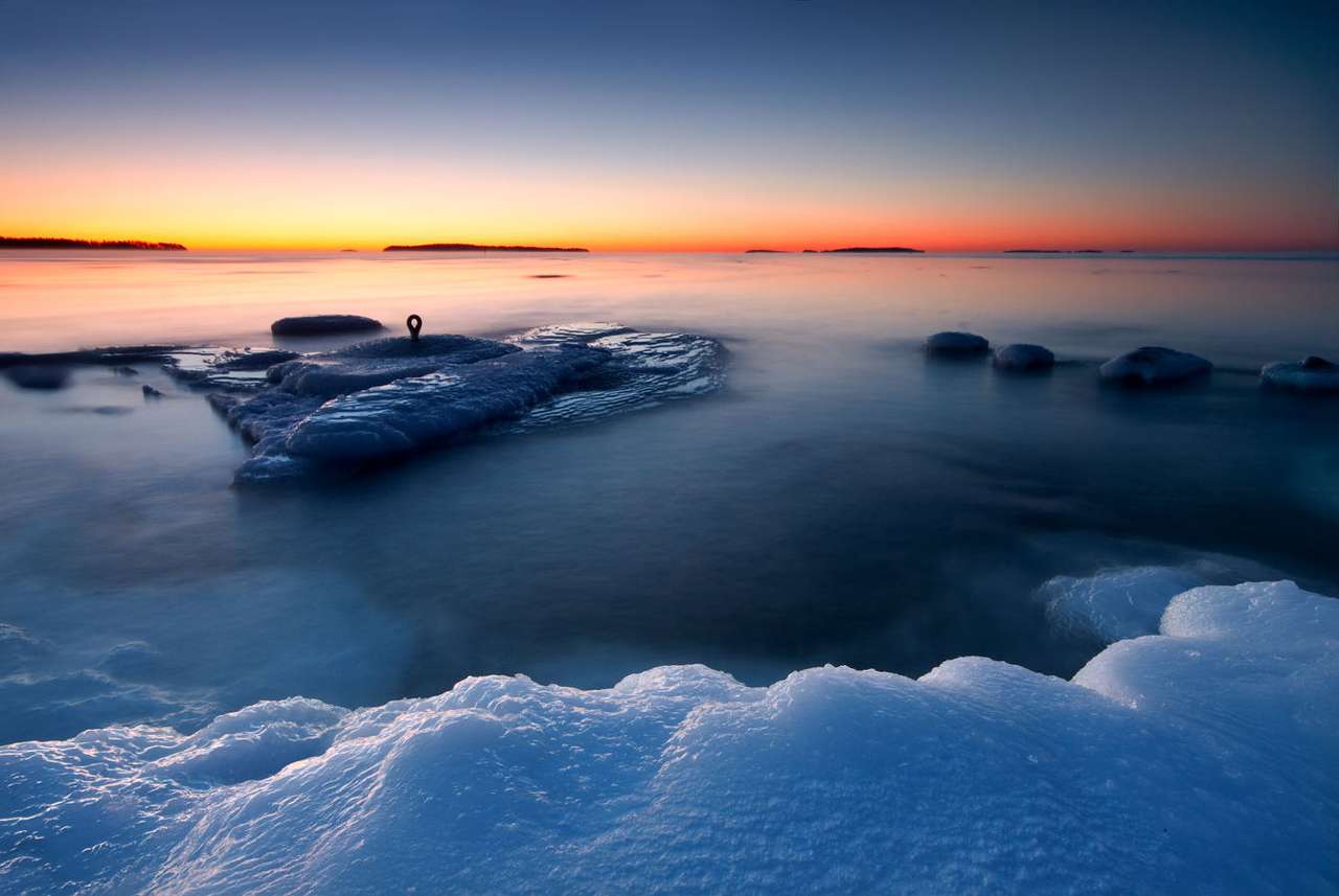 Sonnenaufgang an der Küste von Helsinki (Finnland) Online-Puzzle
