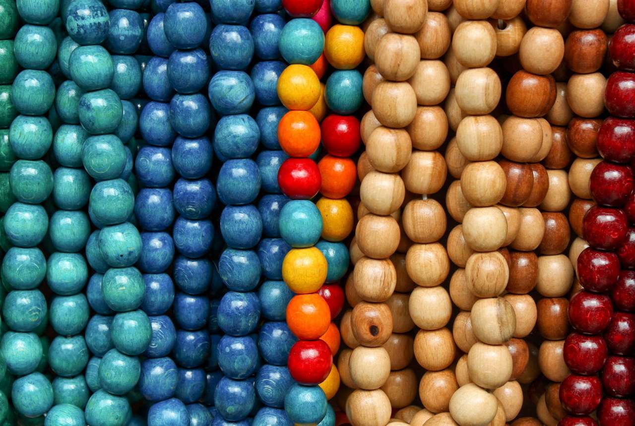 Stall with wooden beads puzzle online from photo