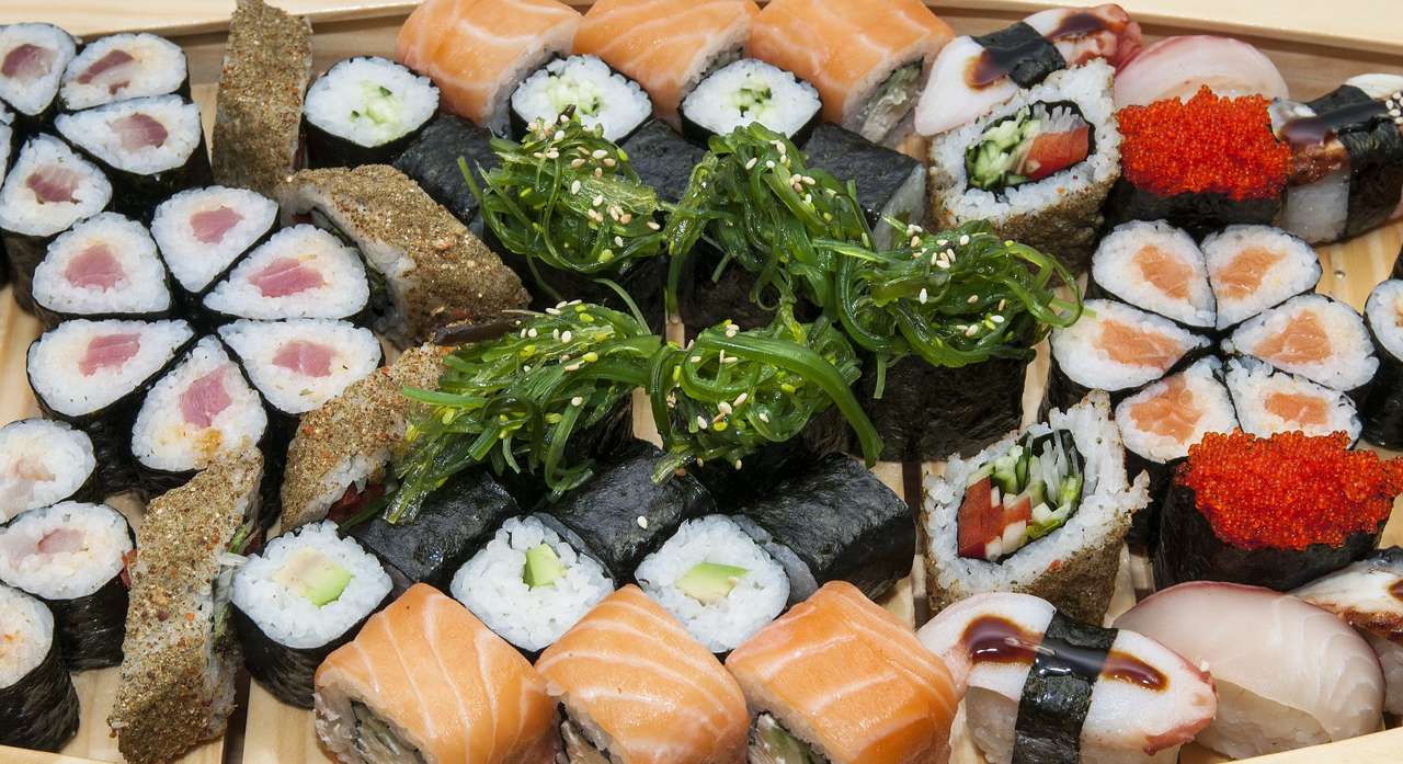 Composition of various kinds of sushi puzzle online from photo