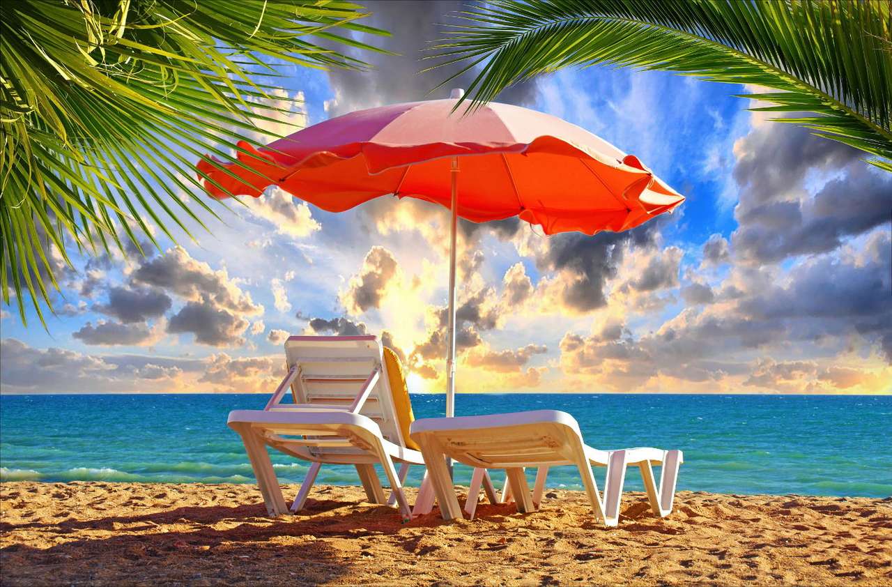 Liegestuhl und Sonnenschirm am Strand in Albufeira (Portugal) Online-Puzzle