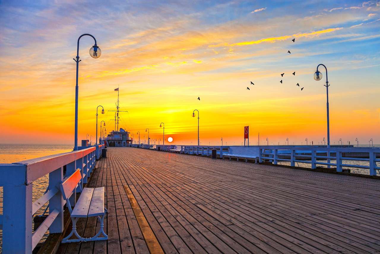 Zonsondergang op de pier in Sopot (Polen) puzzel online van foto