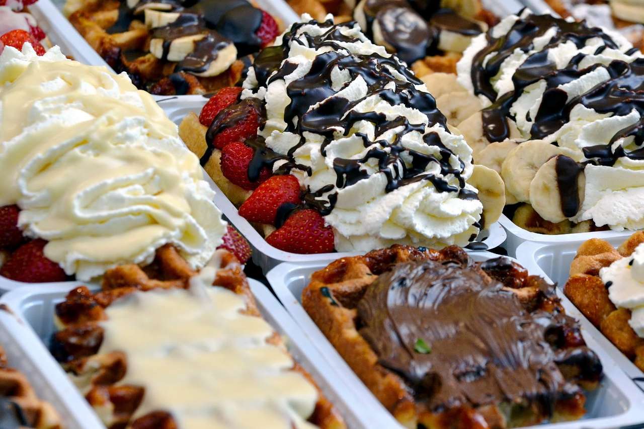Waffles with whipped cream, strawberries and chocolate sauce online puzzle