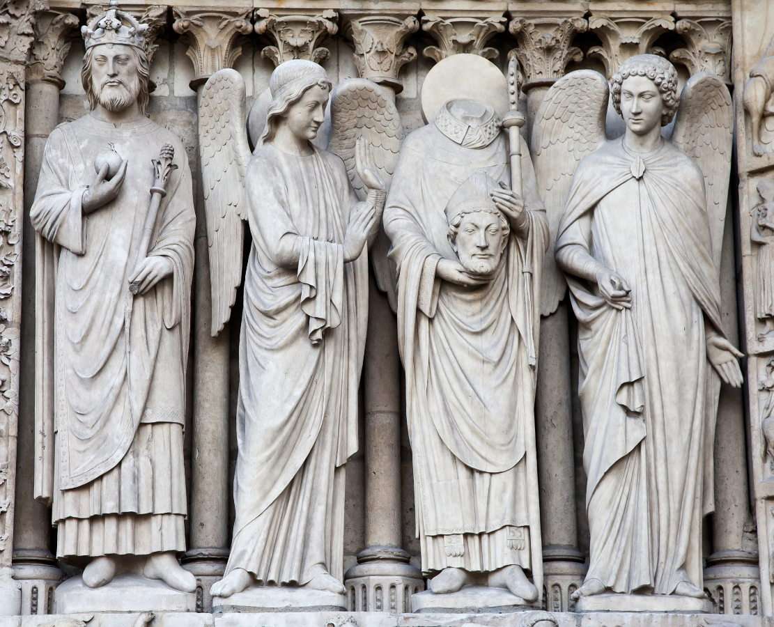 Skulpturer på fasaden av Notre-Dame-katedralen (Frankrike) Pussel online