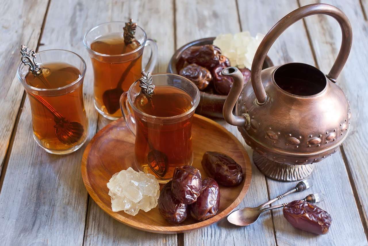 Arab tea with dried dates puzzle online from photo
