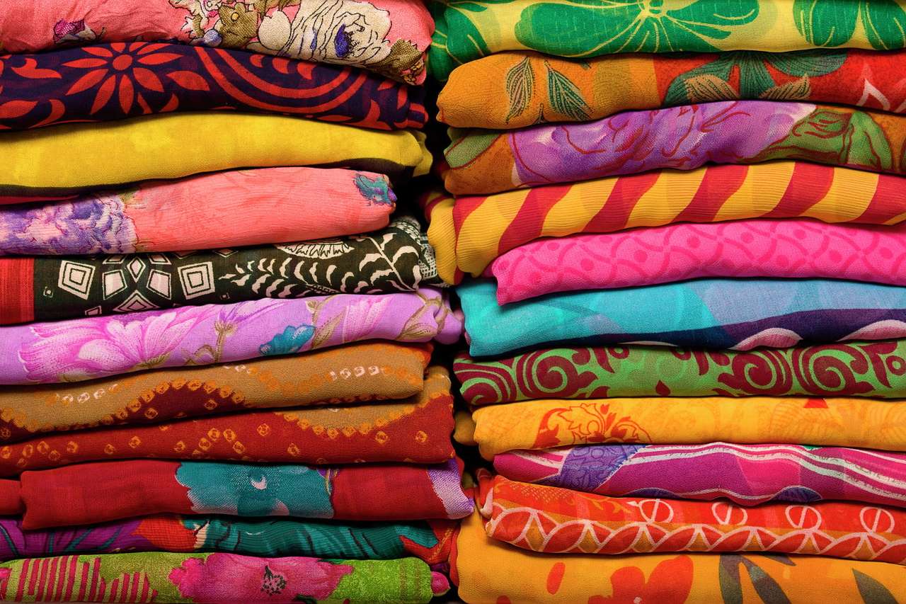 Indian fabrics at a local market online puzzle