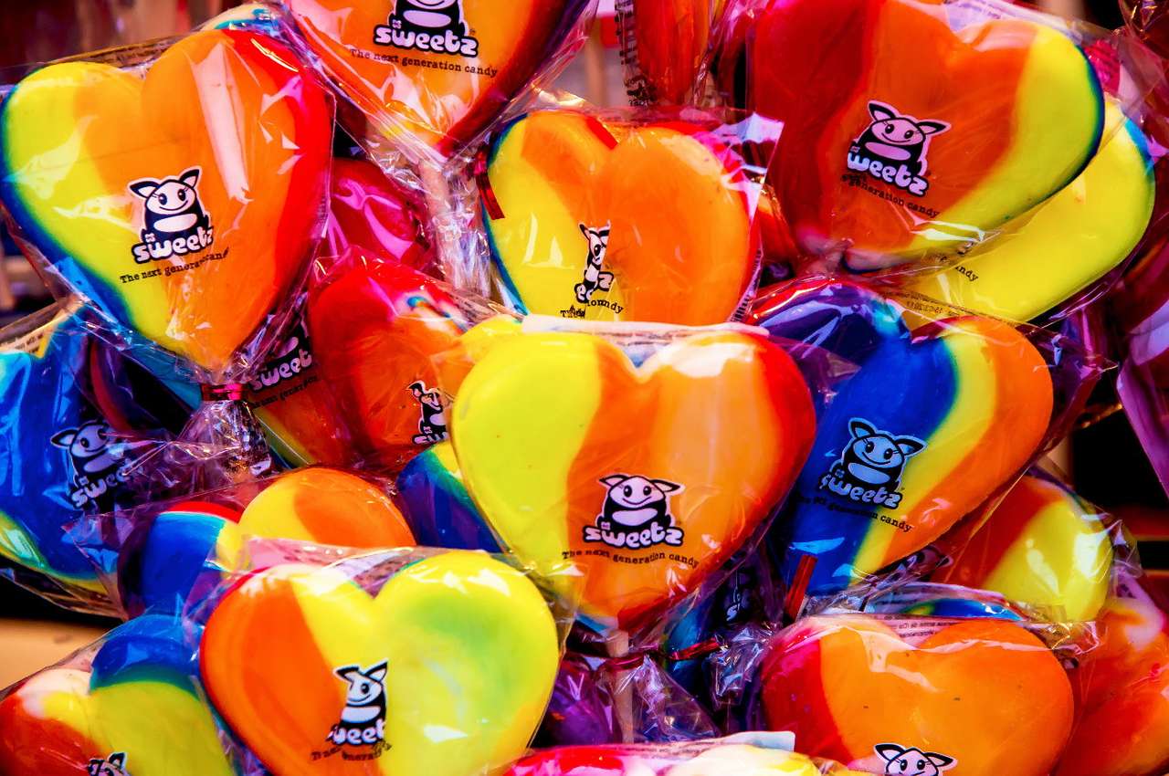 Multi-colored lollipops in the shape of a heart puzzle online from photo