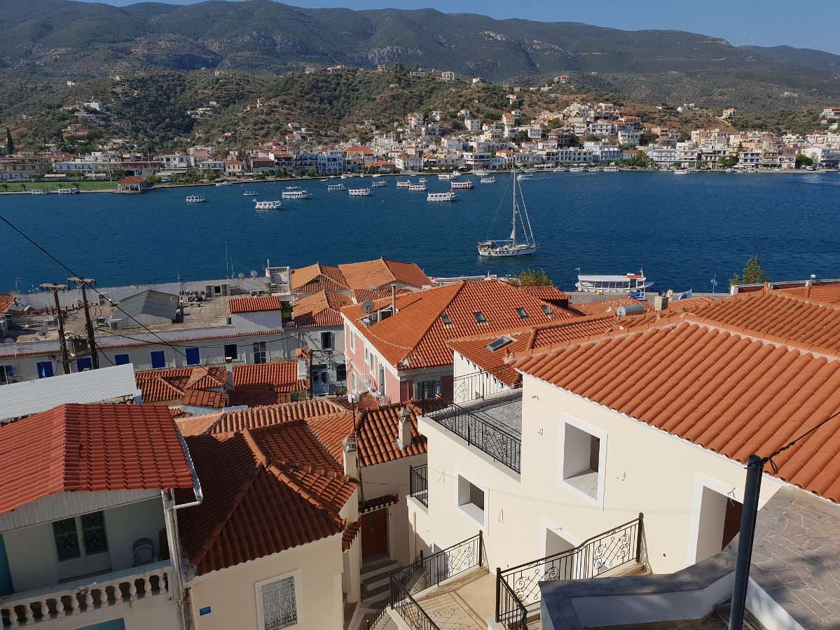 Roofs of Poros over the strait (Greece) online puzzle