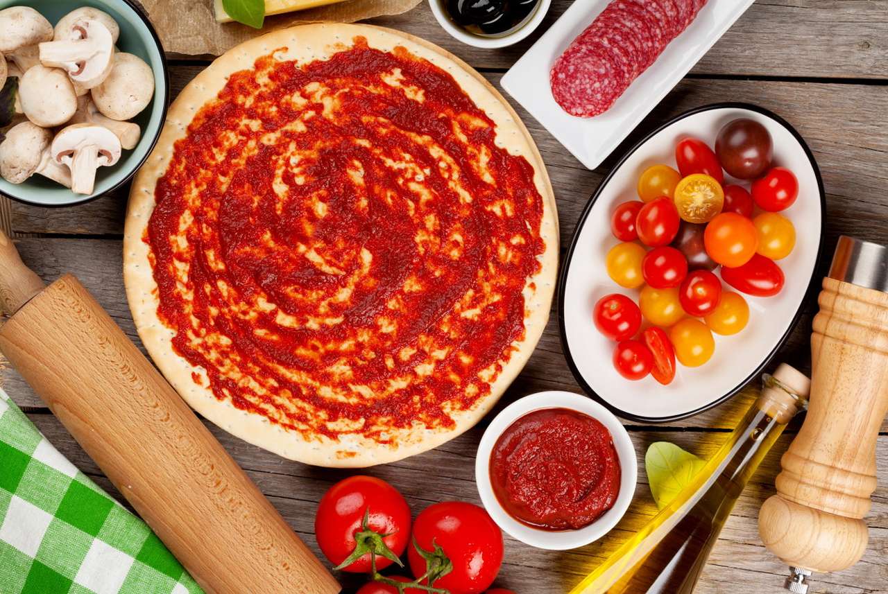 Ingredientes para preparar pizza quebra-cabeça da foto