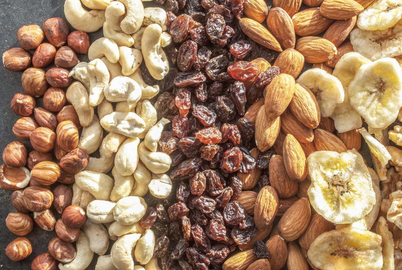 Nuts, almonds and dried fruits puzzle online from photo