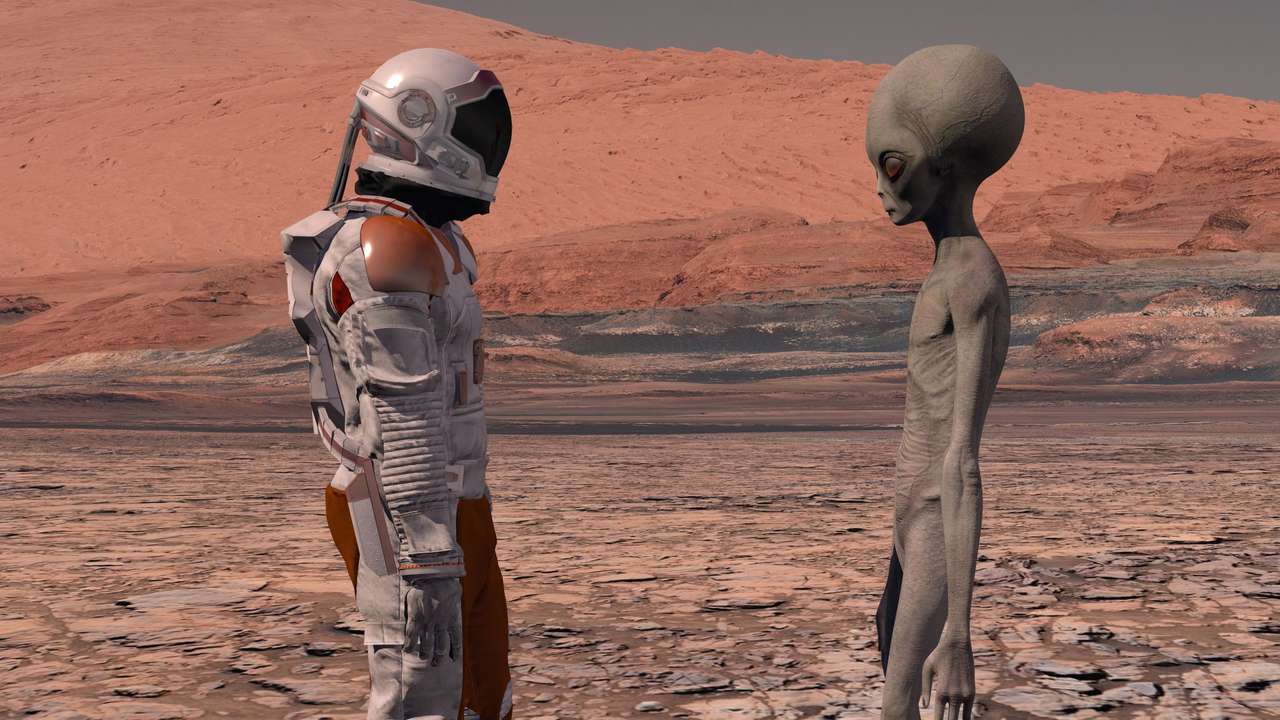 Astronauta e alieni puzzle online da foto