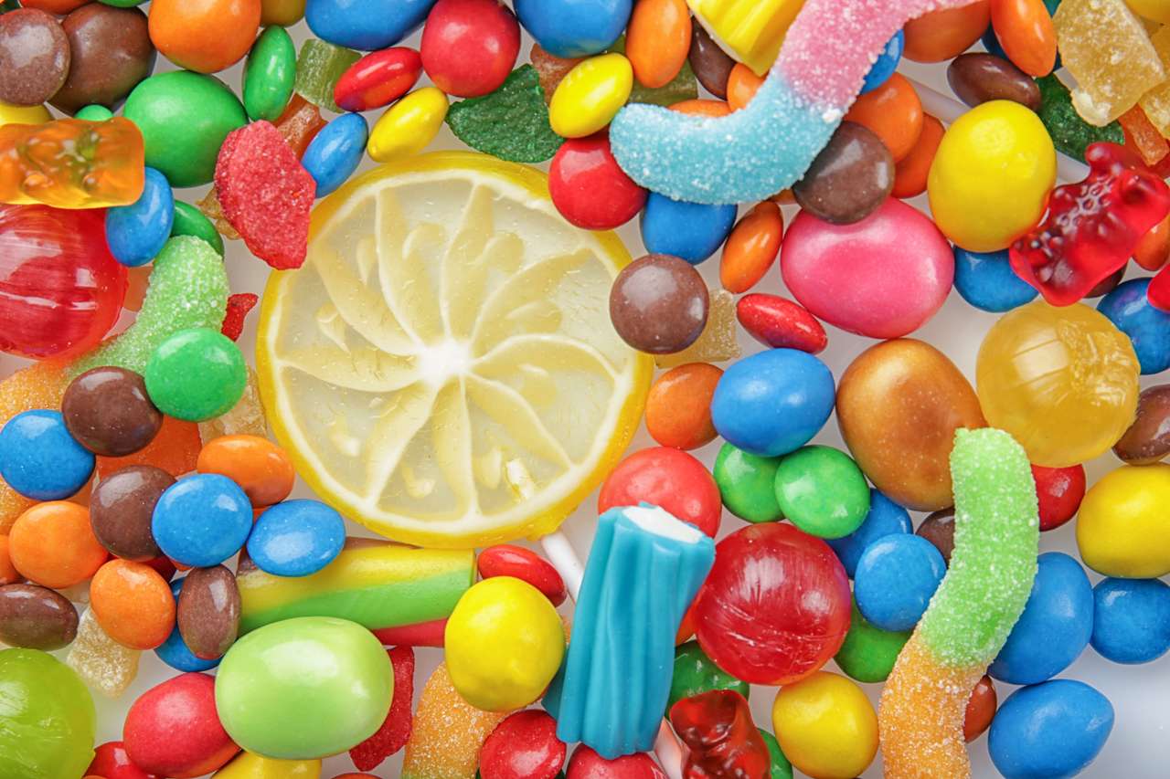Caramelos en colores del arco iris rompecabezas en línea