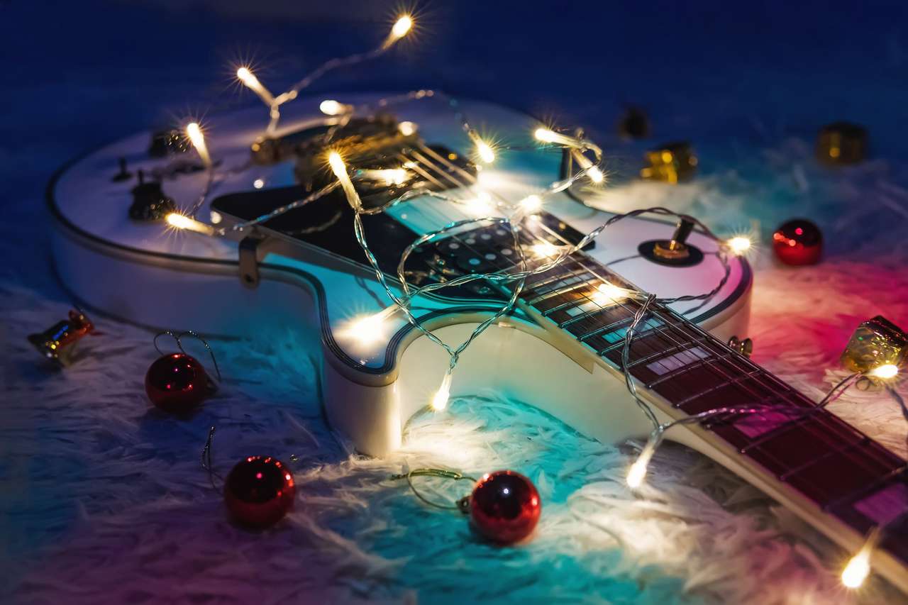 Guitar with decorations puzzle online from photo