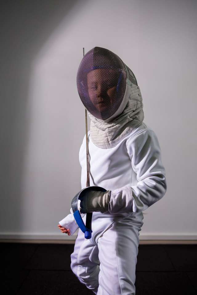 A girl in a fencing suit online puzzle