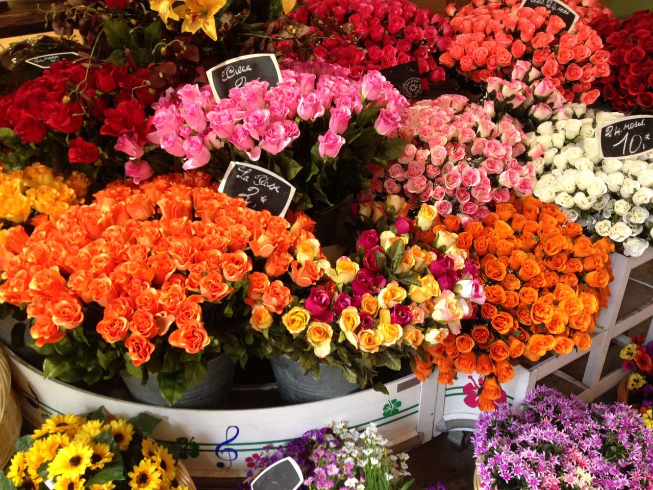 Blomsterbutik i Nice, Frankrike. pussel online från foto