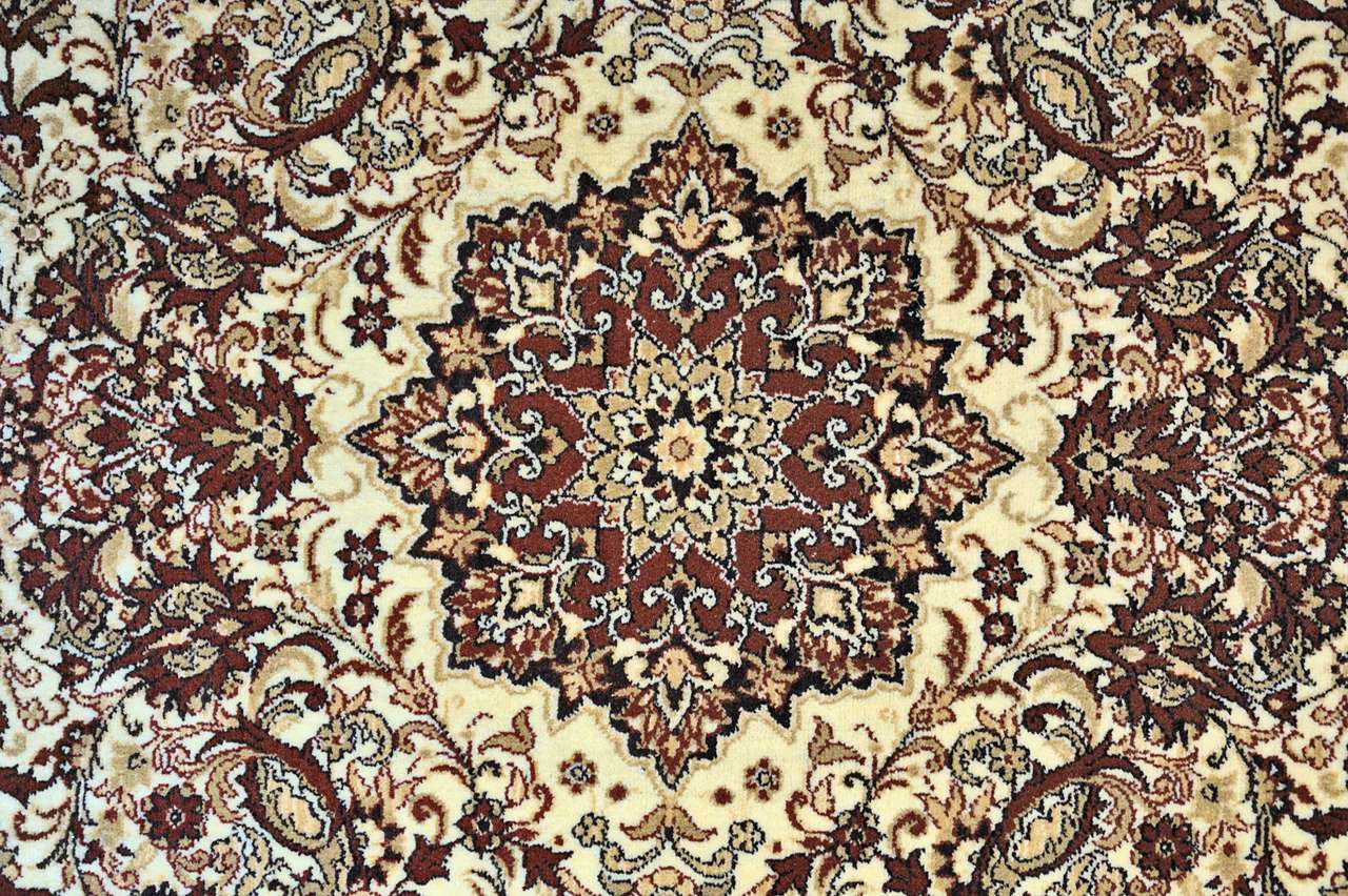 Carpet with ornament as horizontal background puzzle online from photo