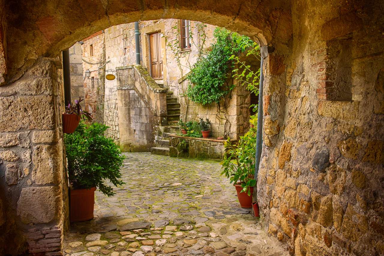 Narrow street of medieval tuff city Sorano online puzzle