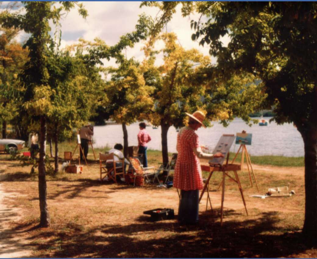 People painting and enjoying the Spring sunshine puzzle online from photo