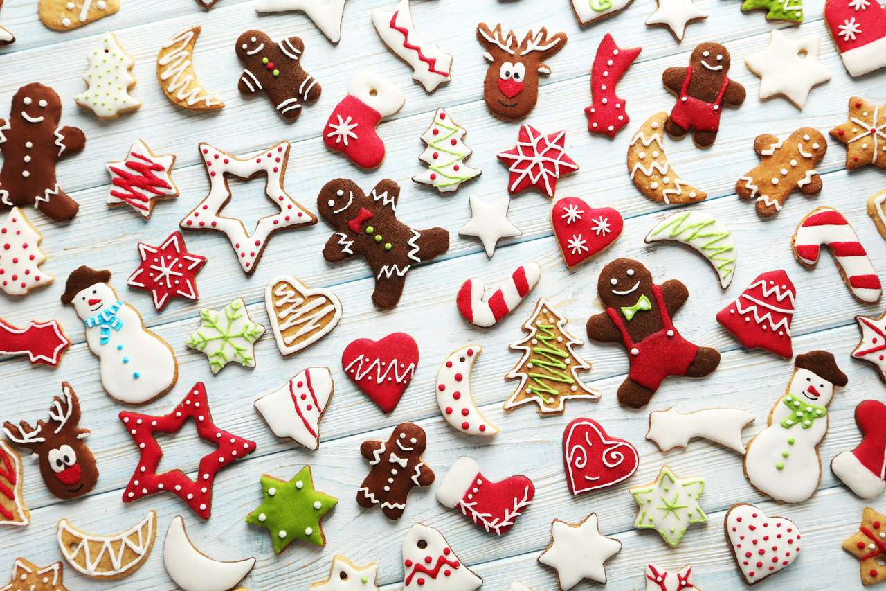 Christmas cookies on a blue wooden table puzzle online from photo