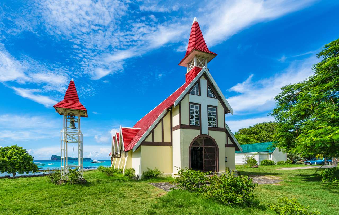 Red church at Cap Malheureux village, Mauritius Island puzzle online from photo