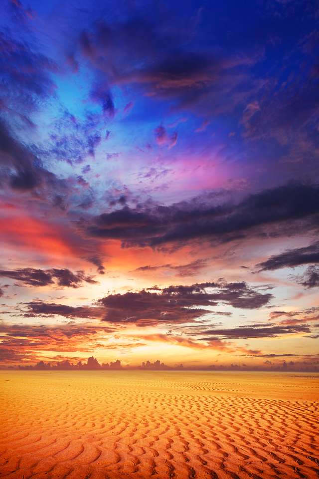 Spectaculaire zonsondergang over de woestijn. puzzel online van foto