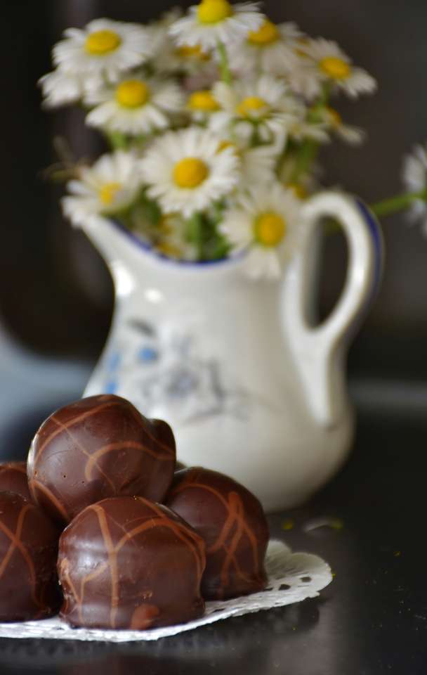 Chocolade en madeliefjes online puzzel