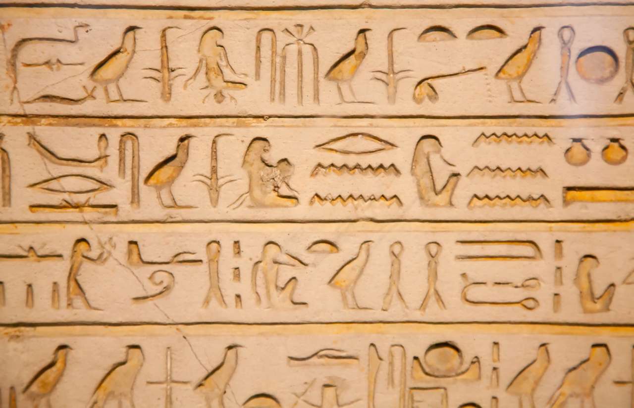 Egyptian hieroglyphs on the wall puzzle online from photo