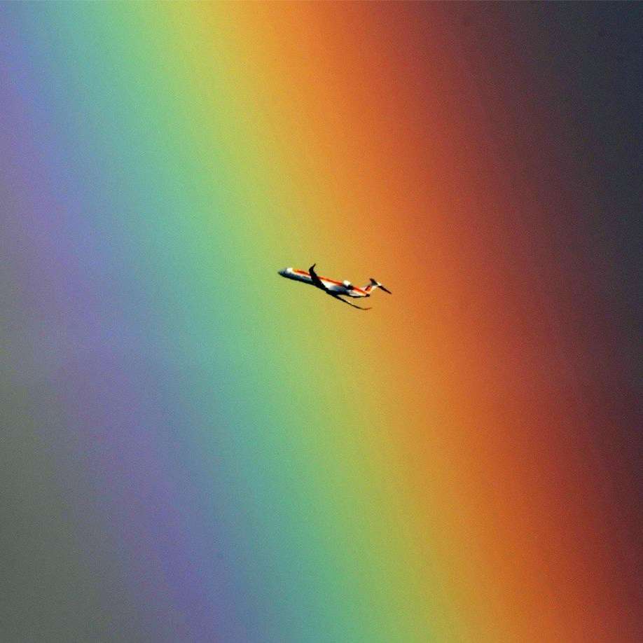 Plane on rainbow puzzle online from photo