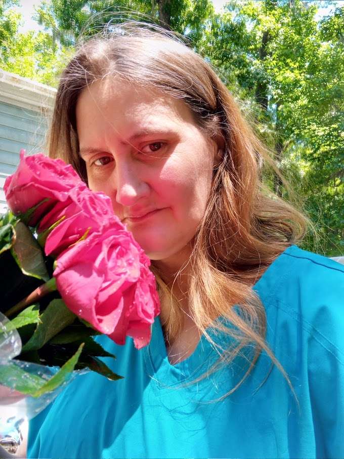 toppa och lukta på rosorna pussel online från foto