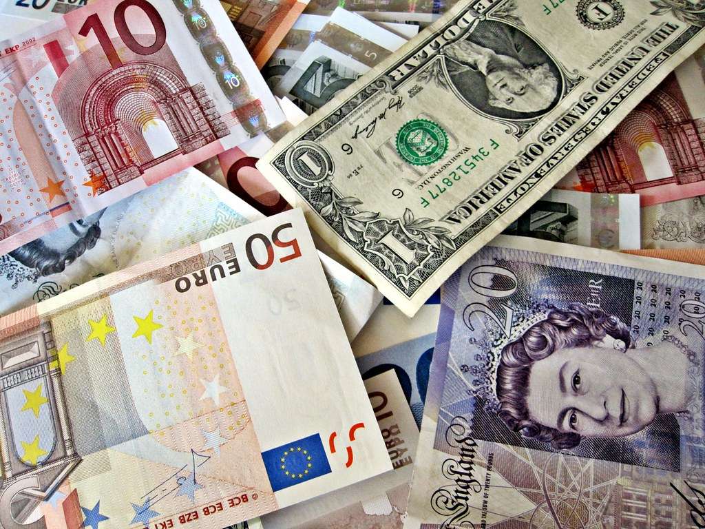 International currencies puzzle online from photo