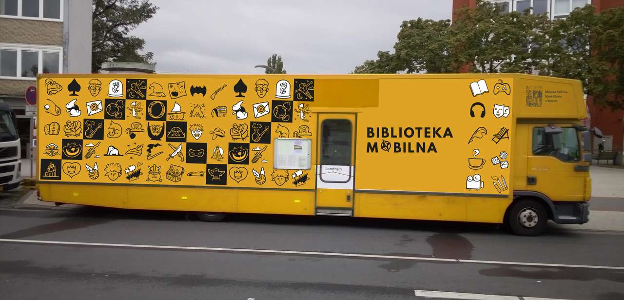 grande ônibus da biblioteca puzzle online a partir de fotografia