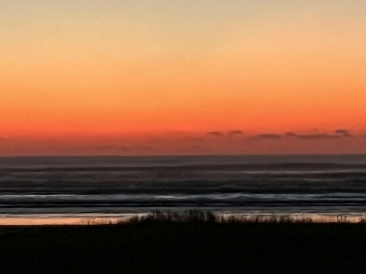 Захід сонця над Тихим океаном онлайн пазл