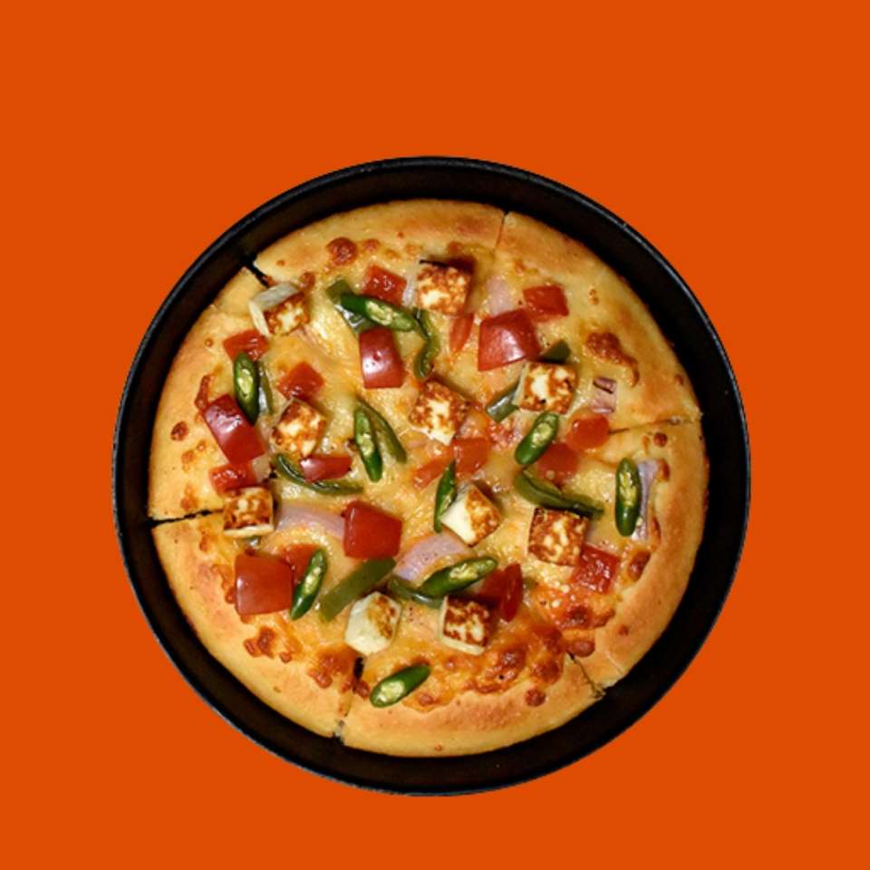 Pizza de parrilla posada puzzle online a partir de foto