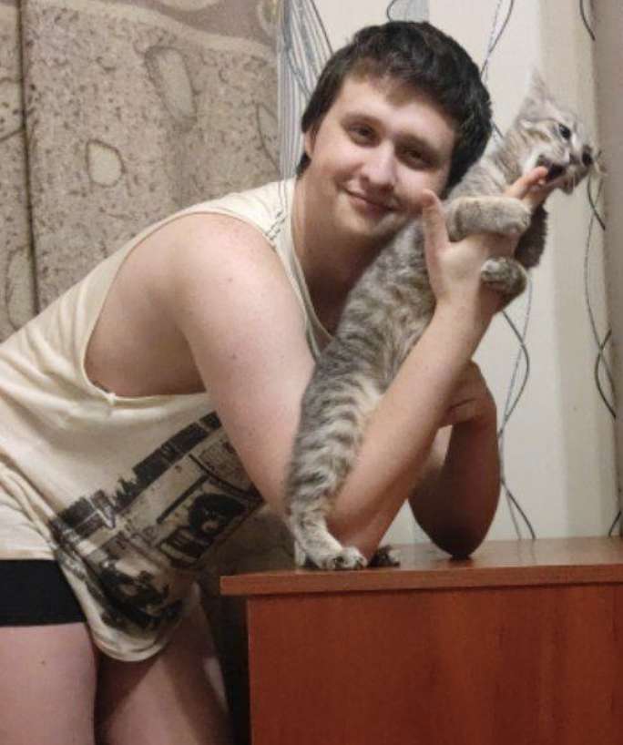 Gatto e uomo che restano puzzle online