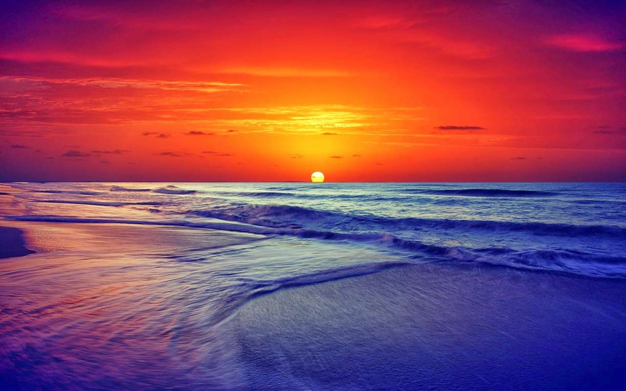 solnedgång stranden Pussel online