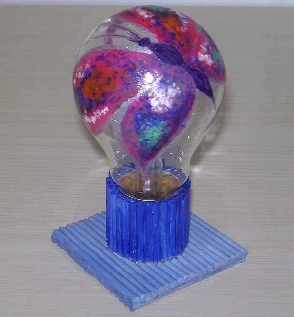 butterfly on incandescent light bulb puzzle online from photo