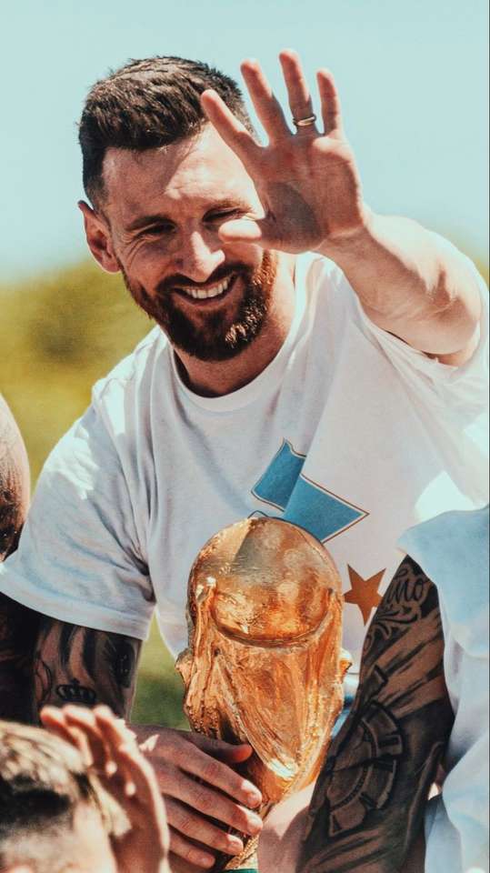 Messi with the cup puzzle online from photo