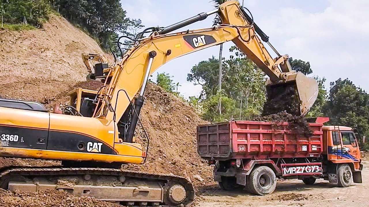 Escavadeira e caminhão basculante puzzle online
