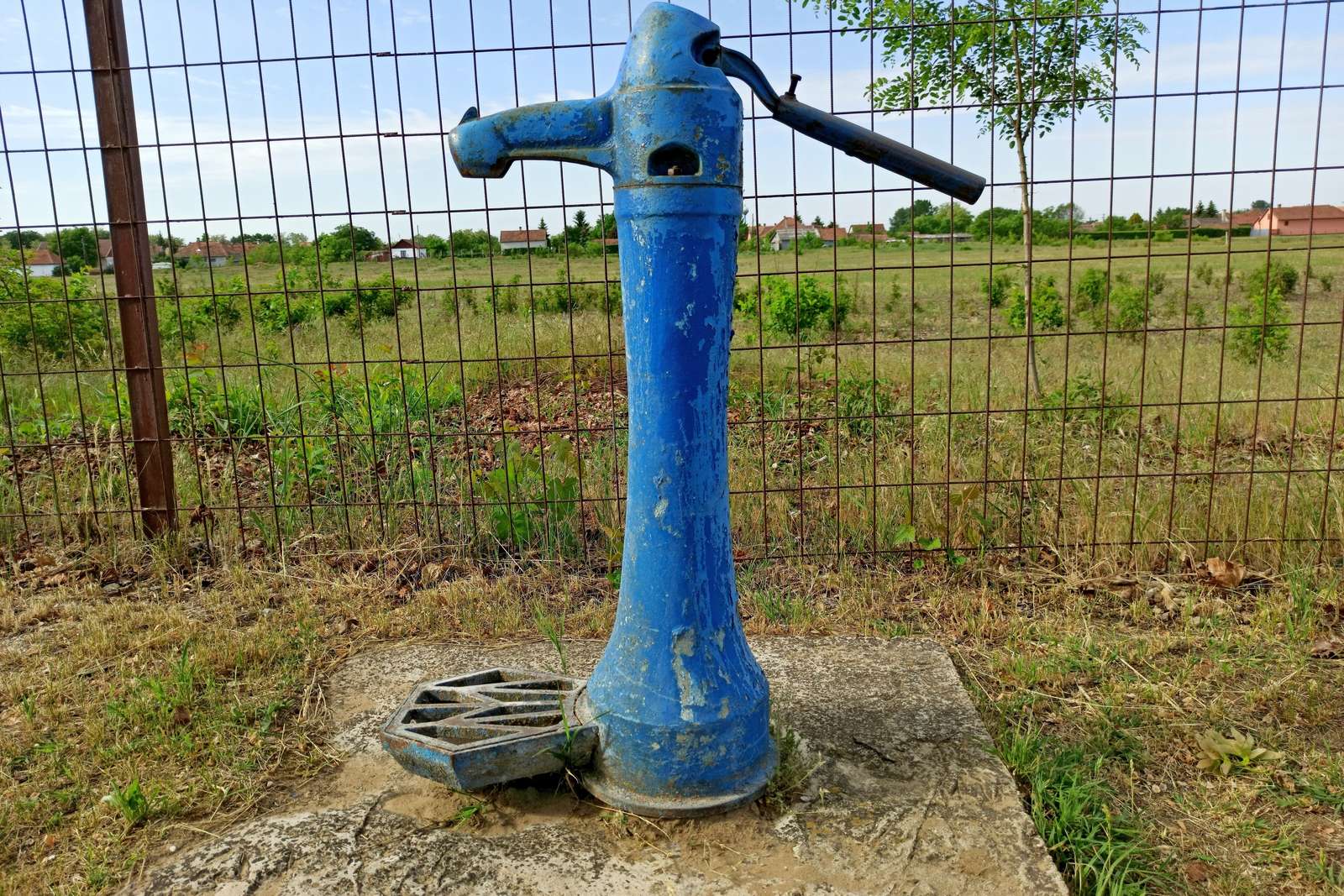 openbare waterput aan het einde van het dorp online puzzel