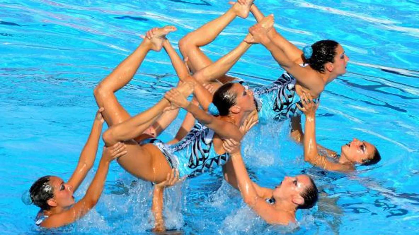 natación sincronizada puzzel online van foto