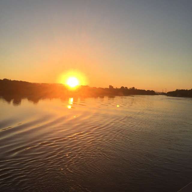 Puesta de sol sobre el lago rompecabezas en línea