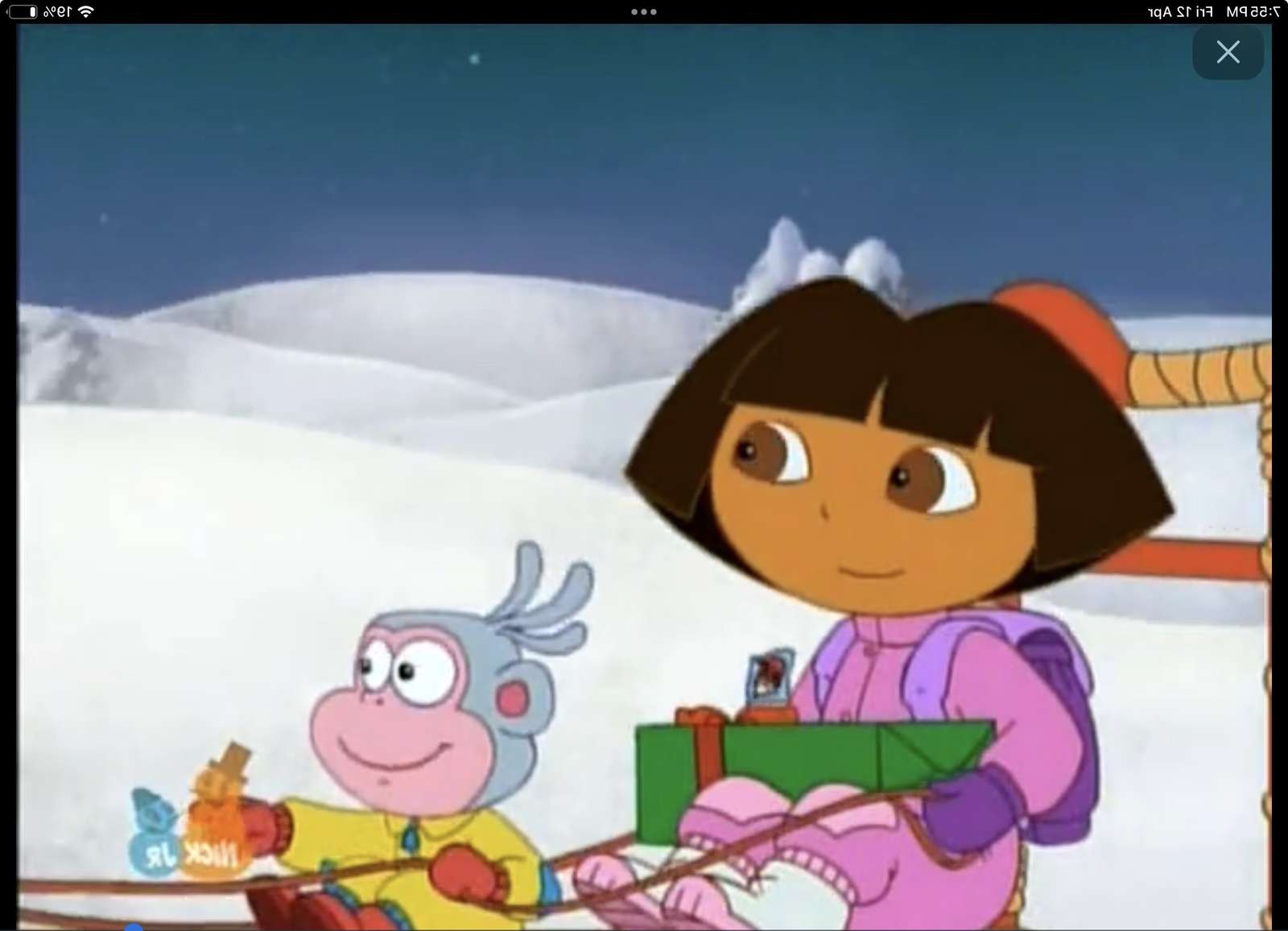 Dora l'exploratrice un cadeau pour le Père Noël puzzle en ligne à partir d'une photo