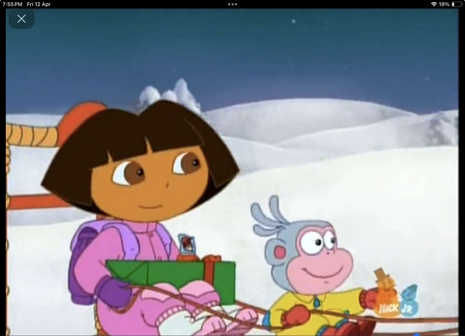 Utforskaren Dora en present till jultomten Pussel online