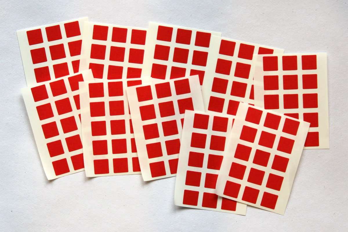 Cuadrados rojos sobre papel. puzzle online a partir de foto