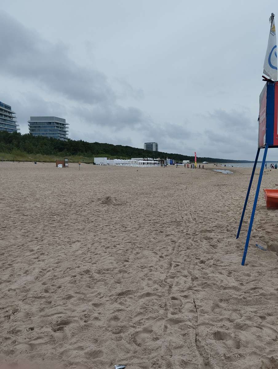 Strand, himmel, moln. Pussel online