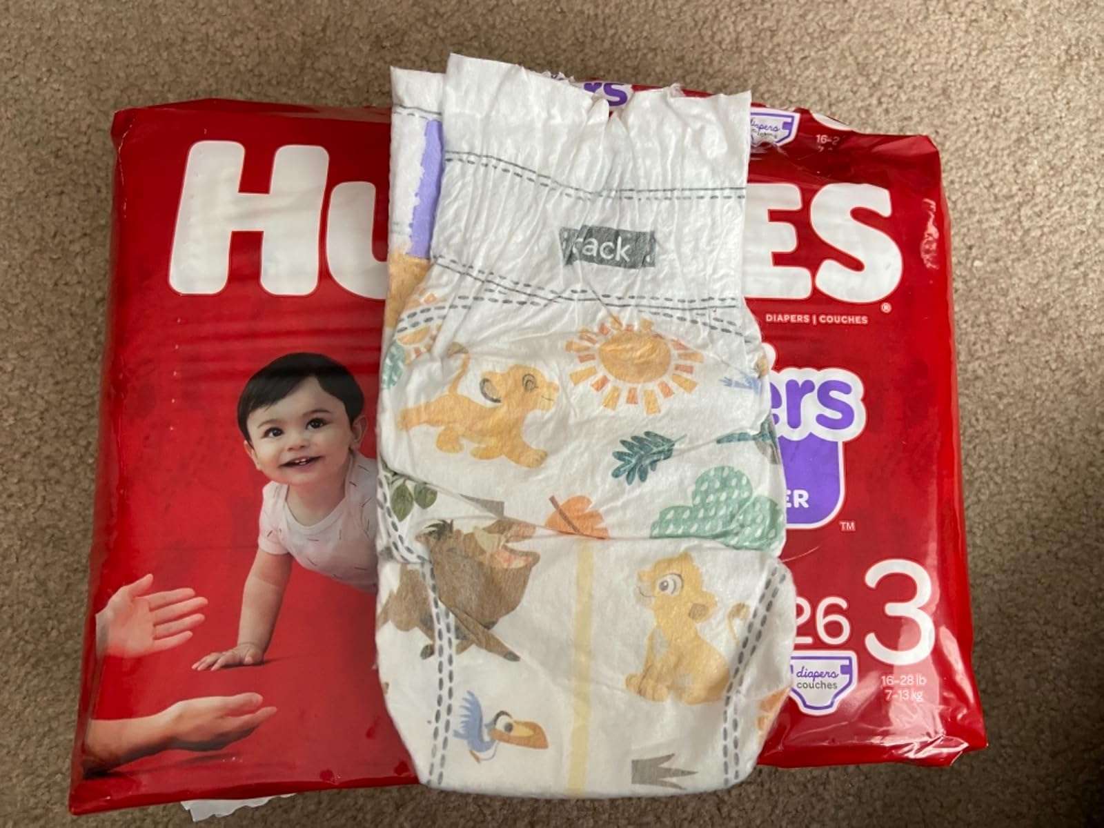 Pieluszka dla niemowląt Huggies Little Movers Król Lew, rozmiar 3 puzzle online