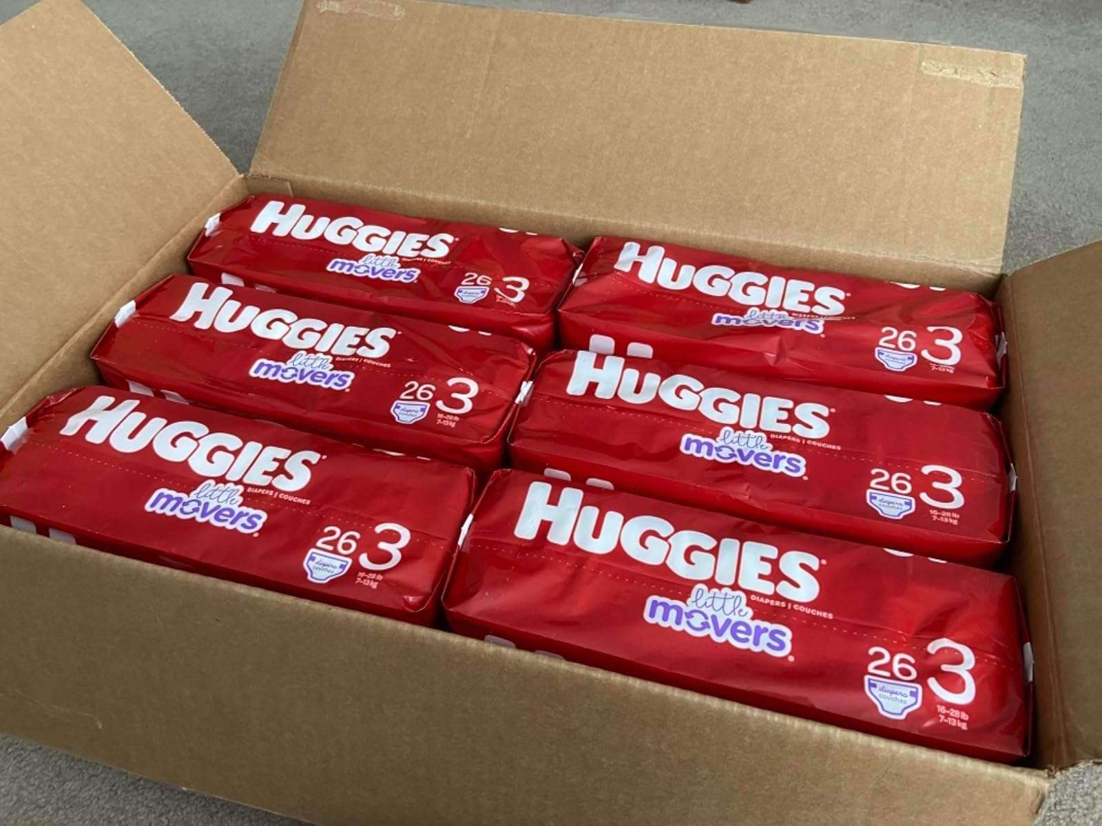 Pieluchy dla niemowląt Lion King Huggies 6 torebek puzzle online ze zdjęcia